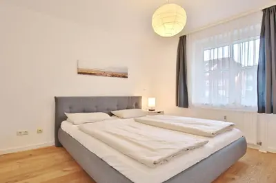 Ein Bett oder Betten in einem Zimmer der Unterkunft Haus Ostseeallee 10 Ostseeallee Appartement 65