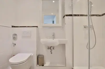Ein Badezimmer in der Unterkunft Haus Miramar Treffert Appartement 21