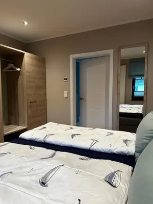 Ein Bett oder Betten in einem Zimmer der Unterkunft Villa SummerGreen