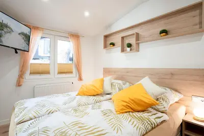 Ein Bett oder Betten in einem Zimmer der Unterkunft Ostseecamp Sandburg