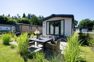 Ein Garten an der Unterkunft Ostseecamp Muscheltraum