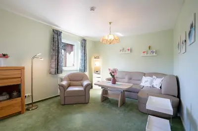 Ein Sitzbereich in der Unterkunft Ferienhaus Niwaki