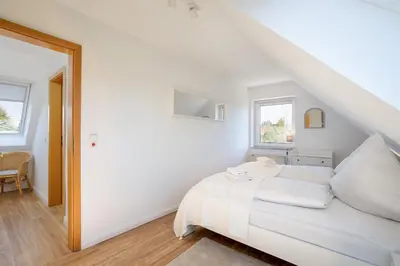 Ein Bett oder Betten in einem Zimmer der Unterkunft Ferienhaus Niwaki
