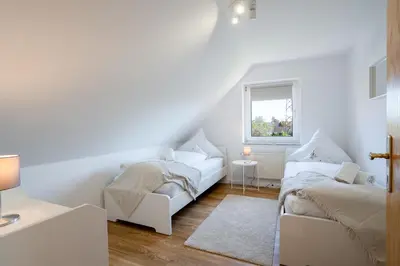 Ein Bett oder Betten in einem Zimmer der Unterkunft Ferienhaus Niwaki