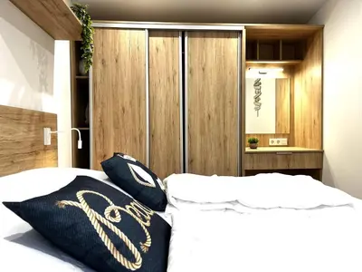 Ein Bett oder Betten in einem Zimmer der Unterkunft Ostseecamp Ostseewind