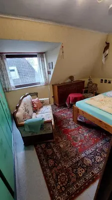 Ein Bett oder Betten in einem Zimmer der Unterkunft Doppelzimmer im Einfamilienhaus, mit eigenem Bad und Küchenmitbenutzung