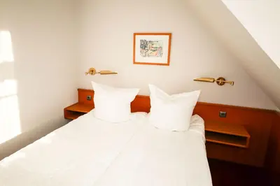 Ein Bett oder Betten in einem Zimmer der Unterkunft 3C-Appartements