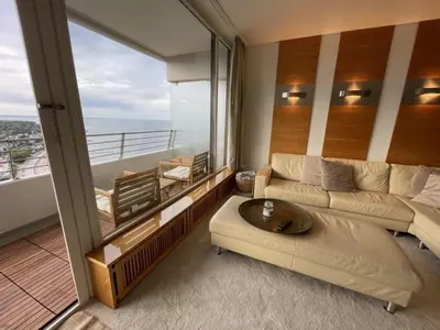 Ein Sitzbereich in der Unterkunft Meeresrauschen 2-Zimmer-Meerblick-Appartement