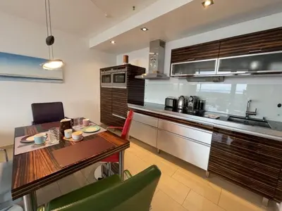 Küche/Küchenzeile in der Unterkunft Meeresrauschen 2-Zimmer-Meerblick-Appartement