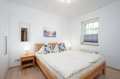 Ein Bett oder Betten in einem Zimmer der Unterkunft LIN 001 - Seepark