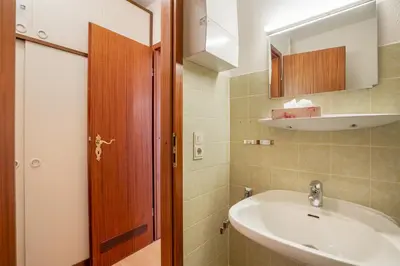 Ein Badezimmer in der Unterkunft HOF 114 - Berliner Hof - Seeblick