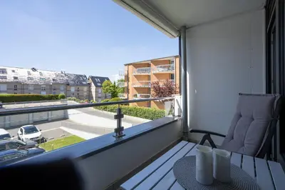 Ein Balkon oder eine Terrasse in der Unterkunft H3 23 - Hanseat - Außenschwimmbad