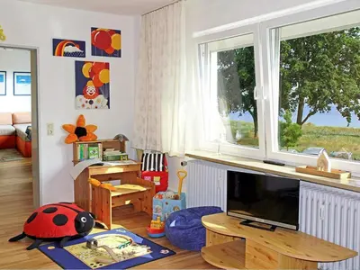 Ein Sitzbereich in der Unterkunft STR 101 - Strandallee 124 - Seeblick