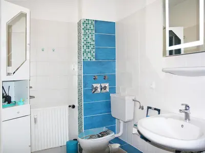 Ein Badezimmer in der Unterkunft STR 101 - Strandallee 124 - Seeblick