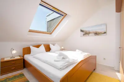 Ein Bett oder Betten in einem Zimmer der Unterkunft STR 028 - Strandburg