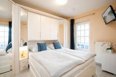 Ein Bett oder Betten in einem Zimmer der Unterkunft LIN 002 - Seepark