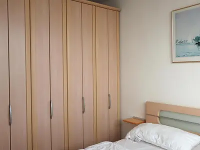 Ein Bett oder Betten in einem Zimmer der Unterkunft H5 57 - Hanseat - Seeblick
