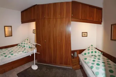 Ein Bett oder Betten in einem Zimmer der Unterkunft TER 304 - Terrassenhuegel -Teilseeblick