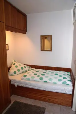 Ein Bett oder Betten in einem Zimmer der Unterkunft TER 304 - Terrassenhuegel -Teilseeblick