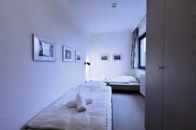 Ein Bett oder Betten in einem Zimmer der Unterkunft RES 511 - Residenz - Teilseeblick