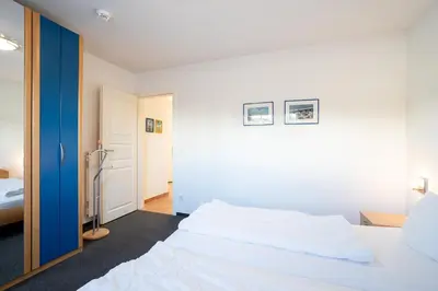 Ein Bett oder Betten in einem Zimmer der Unterkunft FIS 502 - Hanseaten Residenz