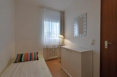 Ein Bett oder Betten in einem Zimmer der Unterkunft HOF 310 - Berliner Hof - Seeblick