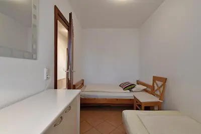 Ein Bett oder Betten in einem Zimmer der Unterkunft HOF 310 - Berliner Hof - Seeblick