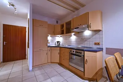 Küche/Küchenzeile in der Unterkunft RES 314 - Residenz - Teilseeblick