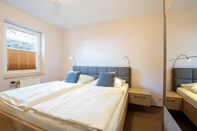 Ein Bett oder Betten in einem Zimmer der Unterkunft FIS 007 - Seeblick