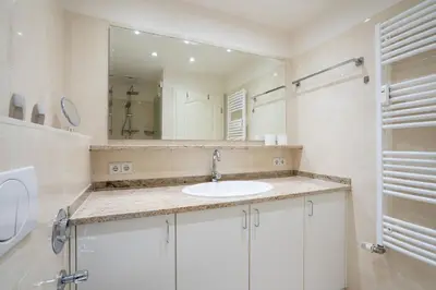 Ein Badezimmer in der Unterkunft H3 53 - Hanseat - Außenschwimmbad