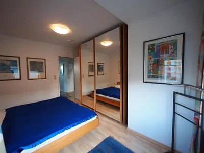 Ein Bett oder Betten in einem Zimmer der Unterkunft AH1 004 - Seeblick