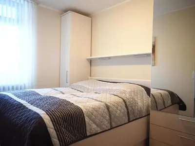 Ein Bett oder Betten in einem Zimmer der Unterkunft HOF 407 - Berliner Hof -Seeblick