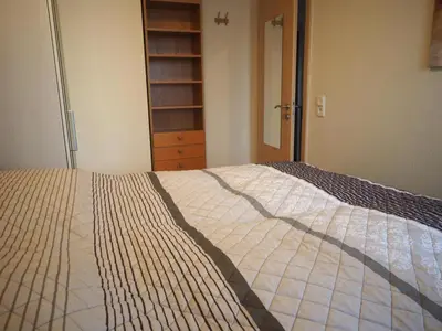 Ein Bett oder Betten in einem Zimmer der Unterkunft HOF 407 - Berliner Hof -Seeblick