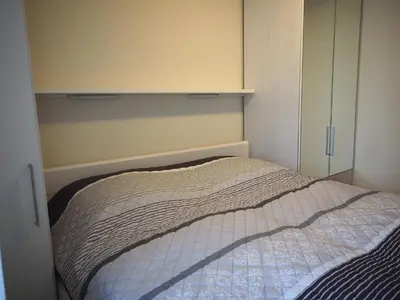 Ein Bett oder Betten in einem Zimmer der Unterkunft HOF 407 - Berliner Hof -Seeblick