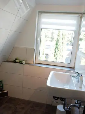 Ein Badezimmer in der Unterkunft AMH 002 - Silbermöwe