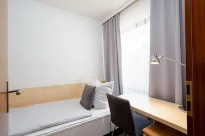 Ein Bett oder Betten in einem Zimmer der Unterkunft RES 303 - Residenz -Seeblick