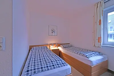 Ein Bett oder Betten in einem Zimmer der Unterkunft BER 511 - Appartementresidenz