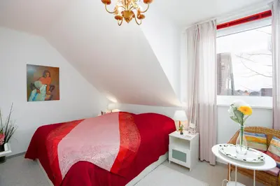 Ein Bett oder Betten in einem Zimmer der Unterkunft Liebevoll eingerichtetes ca 60 qm großes 3-Zimmer-App