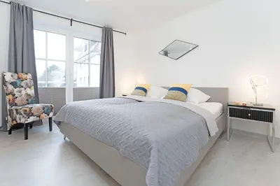 Ein Bett oder Betten in einem Zimmer der Unterkunft Pamirstraße 2 Seeluft