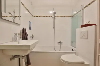 Ein Badezimmer in der Unterkunft Am Kardohr 5, Appartement Meerhauch