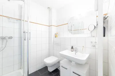 Ein Badezimmer in der Unterkunft Ferienwohnung Lille Sand 1