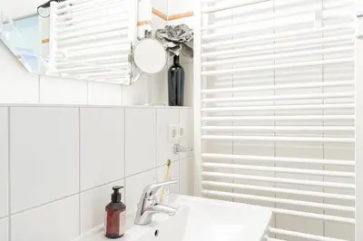 Ein Badezimmer in der Unterkunft Ferienwohnung Lille Sand 1