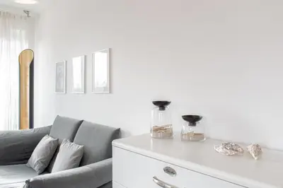 Ein Sitzbereich in der Unterkunft Ferienwohnung Lille Sand 2