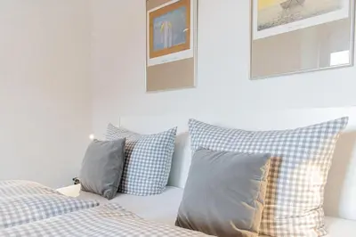 Ein Bett oder Betten in einem Zimmer der Unterkunft Ferienwohnung Lille Sand 2