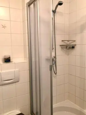 Ein Badezimmer in der Unterkunft Haus Stranddüne MeerZeit Haffkrug