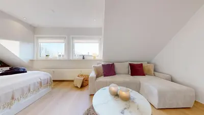 Ein Bett oder Betten in einem Zimmer der Unterkunft Baltic Pearl