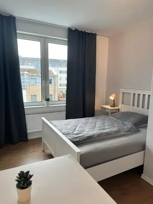 Ein Bett oder Betten in einem Zimmer der Unterkunft Ferienwohnung Hansetraum Lübeck