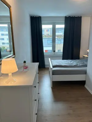 Ein Bett oder Betten in einem Zimmer der Unterkunft Ferienwohnung Hansetraum Lübeck