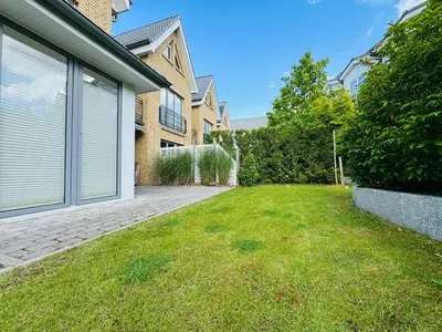 Ein Garten an der Unterkunft Sealect-Hus 4 Timmendorfer Strand, mit Sauna