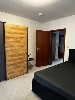 Ein Bett oder Betten in einem Zimmer der Unterkunft Hansestraße